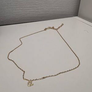 Gold Kate Spade necklace with letter “a” pendant attached!